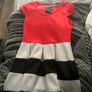 Only worn once size Large but fits sizes 10-12, stretchy material.